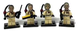 Lego compatible heads on four female Ghostbuster figures